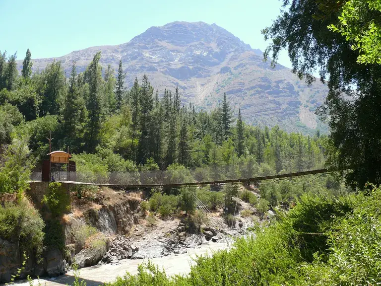 A hanging bridge over the Maipo river in a nature sanctuary of the Cajón del Maipo