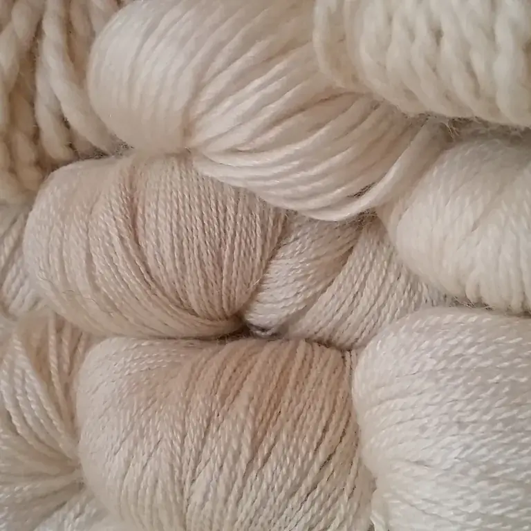 Skeins of natural alpaca yarn spun at Quintessence Alpacas
