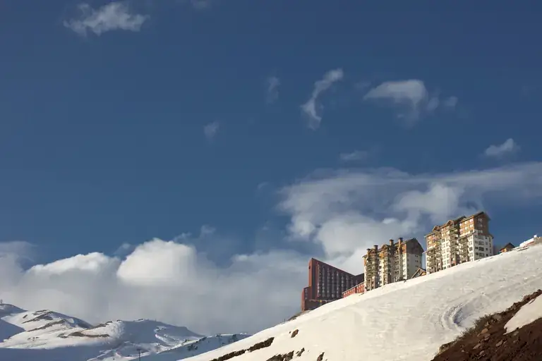 Snow slopes and buildings of Valle Nevado at 3,000 metres in the Andes